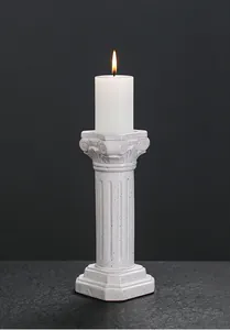 Elegant white ceramic Roman column candle holder with marble texture for table decor.