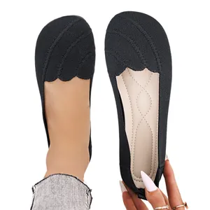 Breathable black knit ballet flats with round toe and comfortable flat sole for women