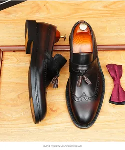 Close-up view of elegant men's leather tassel loafers in burnished finish