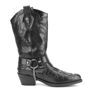 Detailed side view of black crocodile pattern western cowboy boot with metallic chain decor