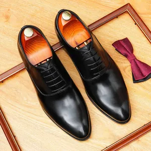 Elegant black genuine leather Oxford dress shoes with hidden height increasing sole