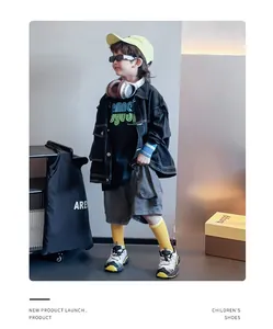 Stylish boy wearing breathable children's daddy shoes with soft anti-slip rubber soles