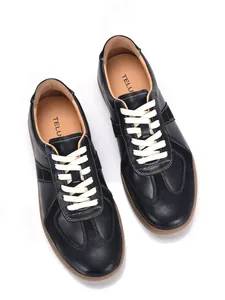 Classic black leather German Army Trainers for men with white laces and gum soles