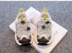 Close-up detail of breathable children's sneakers featuring a convenient quick-lace toggle system