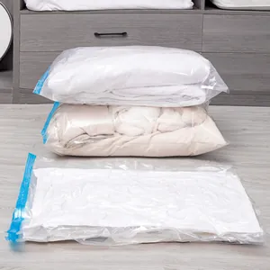 Vakuum-Aufbewahrungsbeutel für Kleidung und Steppbetten mit blauen Verschlüssen.