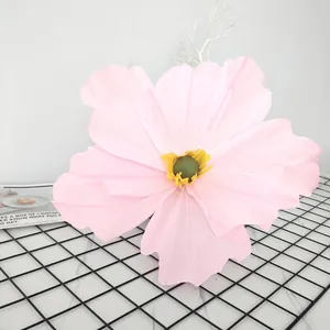 Large pink DIY crepe paper poppy flower for decorative wall or mall display