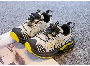 Detail view of breathable children's sneakers with quick-lace system and mesh design