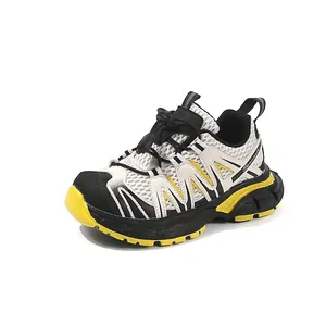 Breathable kids' outdoor sports sneakers with mesh upper in yellow and black tones