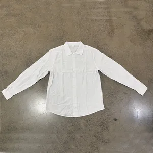 Classic white linen long-sleeve shirt with button-down collar and relaxed fit for casual wear