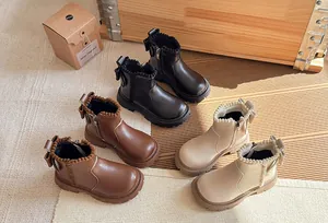 Collection of children's ankle boots in black, brown, and beige with plush collars