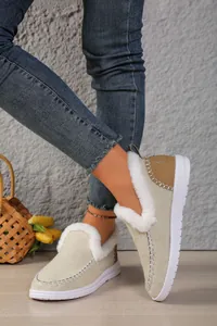 Women's cozy fleece-lined snow boots with faux fur trim and textured rubber soles.