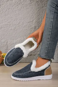 Detail showing cozy grey faux fur-lined winter loafers with elegant moccasin stitching