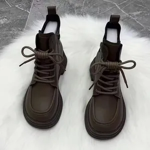 Retro British style brown leather Martin boots for women featuring thick soles and laces.
