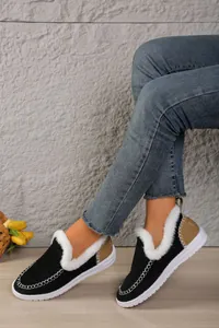 Detail view of warm fleece-lined snow boots with white faux fur trim and decorative stitching