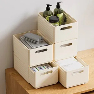Stackable cream-colored plastic desktop storage bins for organizing sundries and toys