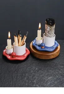 Artistic detail of ceramic mushroom incense burner and candle holder for sage palo santo