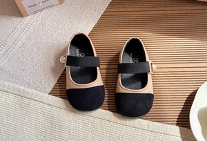 Top view of elegant French style Mary Jane shoes for girls with pearl buckle details