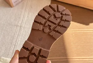 Close-up of anti-slip rubber sole detail on children's British style Martin boots