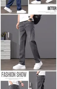 Dettaglio dei jeans da uomo in tencel a gamba dritta nei colori grigio e blu