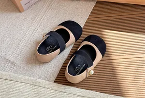 Detailed top view of French style girls' Mary Jane shoes with pearl buckle and soft sole