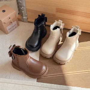 High-quality children's British style Martin boots available in black, cream, and brown