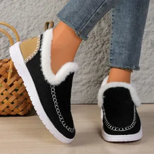 Black fur-lined slip-on snow boots with white plush trim and durable rubber soles