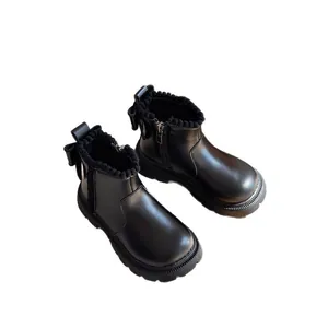 Black girls' British style Martin boots with fleece lining and cute back bow accent.