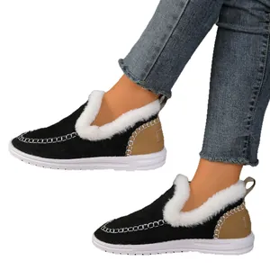 Comfortable women's warm plush-lined snow boots with faux fur trim and slip-on flat sole.