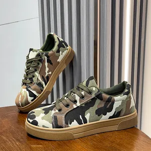 Detailed side and top view of women's camouflage canvas sneakers with durable flat soles