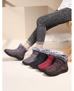 Women's waterproof snow boots with warm faux fur lining shown in multiple colors