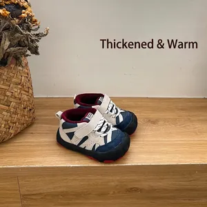 Detailed view of children's winter sneakers with warm fleece lining and soft rubber sole