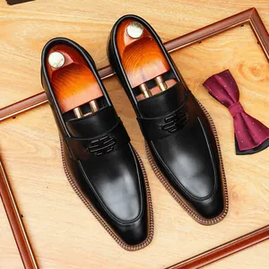 Elegant men's black genuine leather loafers with metallic double B buckle detail