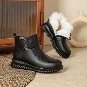 Winter black ankle boots for women with thick white faux fur lining and soft flat sole