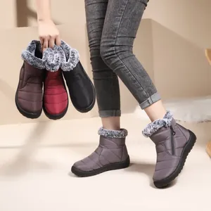 Women's waterproof snow boots with warm fur lining and non-slip soles in multiple colors