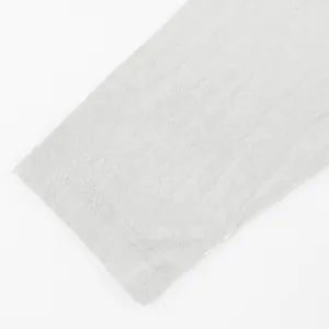 Detailed macro view showing the high-quality breathable light gray linen fabric texture