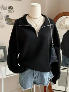 Stylish women's casual black solid half-zip sweatshirt with lapel collar for autumn and winter