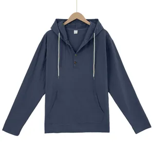 Front view of men's casual blue linen hooded Henley shirt with large kangaroo pocket