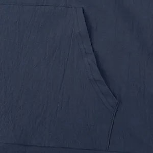Close-up of linen fabric texture and large pocket detail on navy men's hooded casual shirt