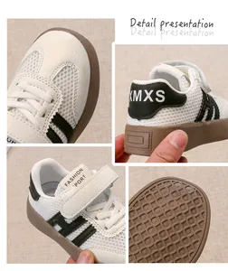 Nahaufnahme der atmungsaktiven weißen Mesh-Sneaker für Kinder mit Sohlendetails