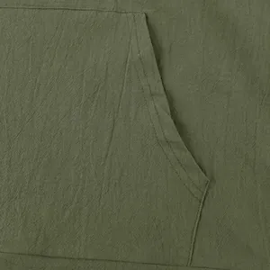 Macro shot of army green linen fabric detail showing durable double stitching on pocket.
