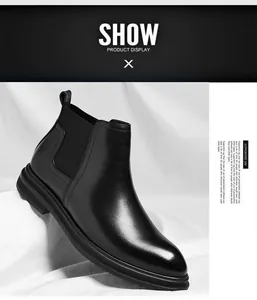 Detailed view of professional men's black leather Chelsea boots with elastic side panels.
