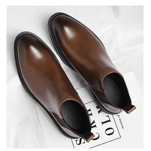 Top-down view of premium brown leather Chelsea boots for men with elastic side panel