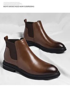 Classic brown leather Chelsea boots for men displayed on a soft white fabric background