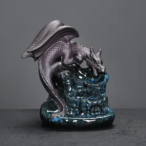 Creative Gothic winged dragon ceramic backflow incense burner on a blue glazed base