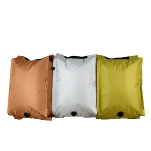 Three colorful airtight vacuum storage bags for clothes and quilts on white background