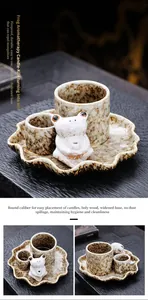 Detail view of ceramic frog aromatherapy burner with lotus leaf tray