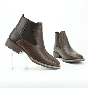Side view of brown faux ostrich leather Chelsea boots for men with elastic side panels