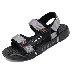 Comfortable black and grey outdoor travel sandals with breathable mesh and adjustable straps