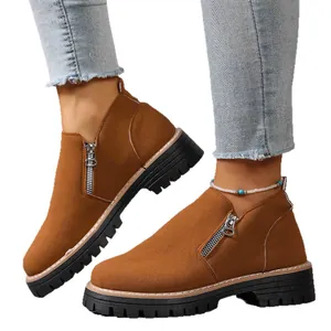 Brown suede round toe loafers for women featuring side zipper and chunky black sole