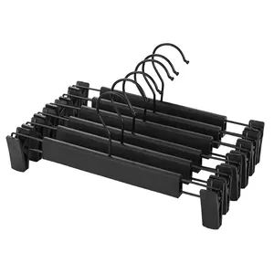 Lot de 5 cintres à pantalons en plastique noir mat dotés de pinces réglables et souples